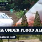 Georgia under flood alert after heavy rain while the West faces dangerous heat