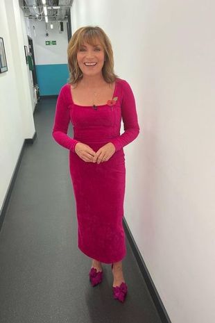 Lorraine looked incredible in a pink figure hugging dress and matching shoes