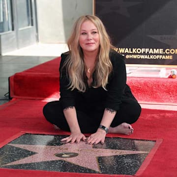 Christina Applegate wearing black unveiling her hollywood star of fame